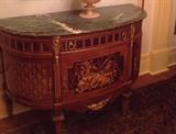 20thc French style marquetry marble top demi lune commode