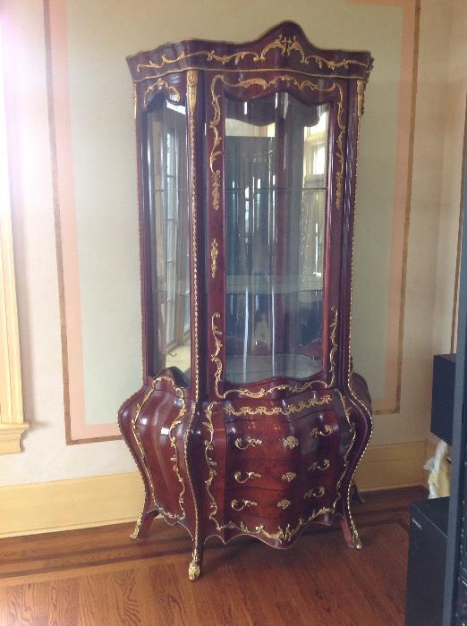 Fine French style bombe curio cabinet with curved glass