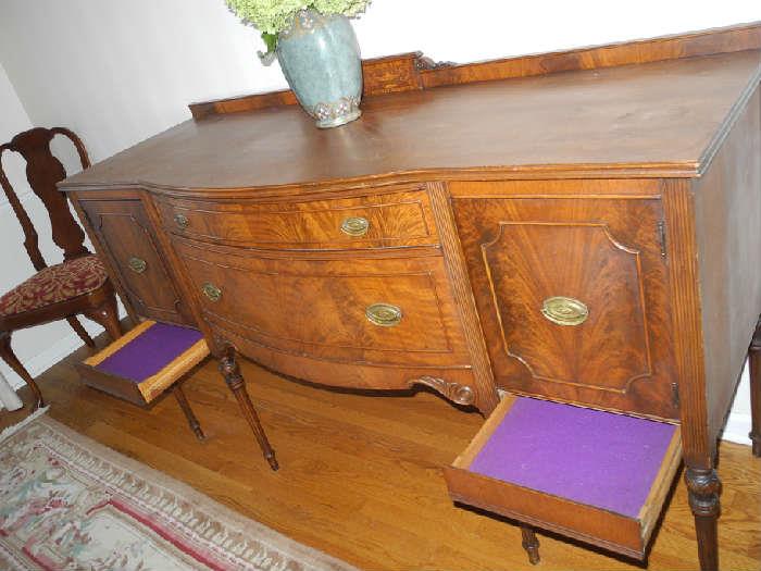 Gorgeous sideboard with hidden drawers!