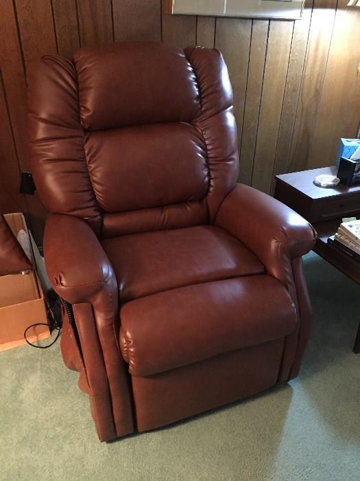 Electric brown riser and recliner...used for only a few months.