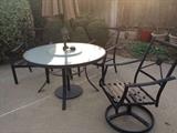 Patio Set with 4 Chairs.  Glass top