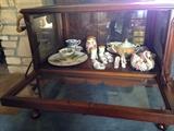Antique English Tea cart. Beautiful condition. Original caning on side. Lefton china, Lefton shoes, Lefton geese and violin