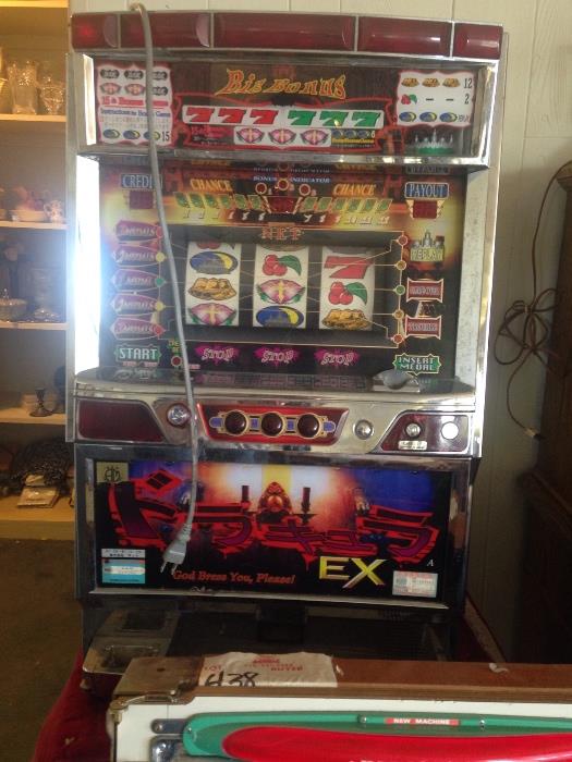Vintage token style slot machine