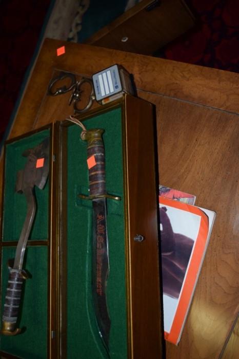 Knife and case and ax and German magazine