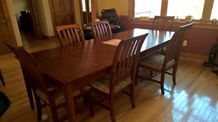  dining room table, 5 1/2 foot side board and chairs
