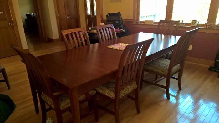  dining room table, 5 1/2 foot side board and chairs