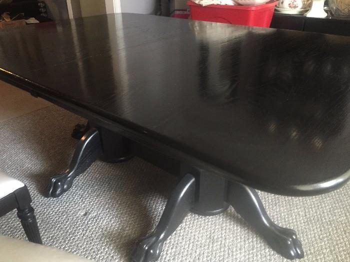 AMISH-BUILT 4 FT X 10 FT SOLID OAK TABLE.  HAS 4 LEAVES.  BEAR CLAW FEET.