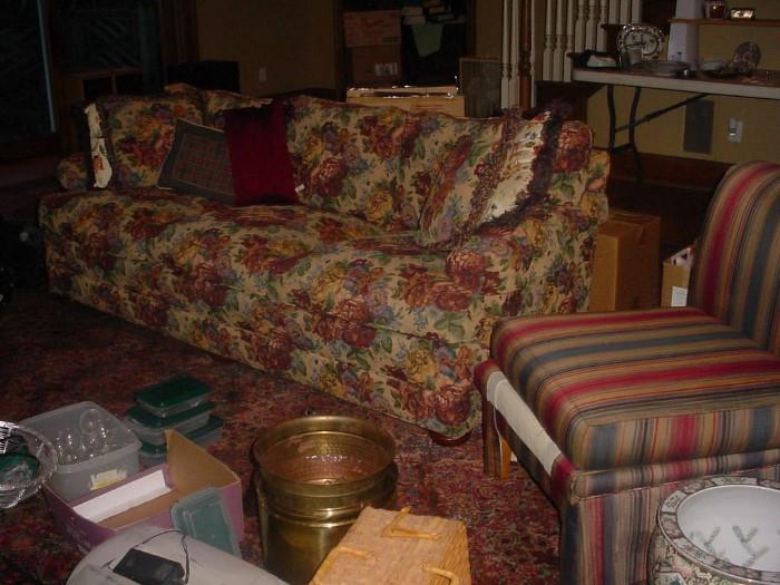 There are two sofas, several side chairs, and more