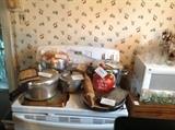 Presto Pressure Cooker, West Bend Bun oven, aluminum pots, microwave and cart , Many vintage federal glass antique car glasses, Seasons Greetings glasses