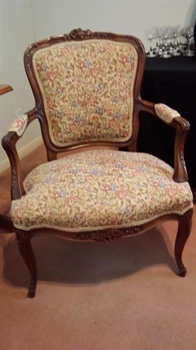 Antique arm chair with carving