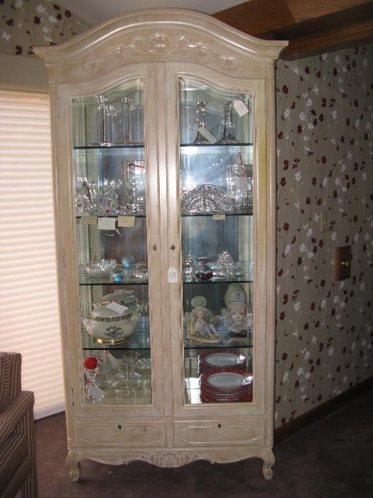 A lovely lighted Curio/Display cabinet.