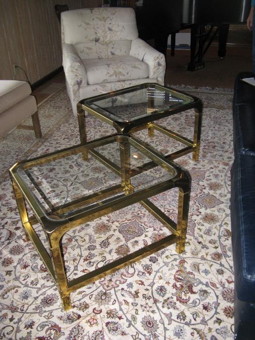 A pair of brass and glass accent tables. And a 9' x 12' Oriental Rug.