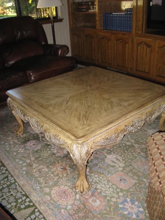 Antiqued square wood coffee table.