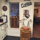 spice cabinet in window, antique icebox look cabinet, signs, misc wall art, clay cov'd dish