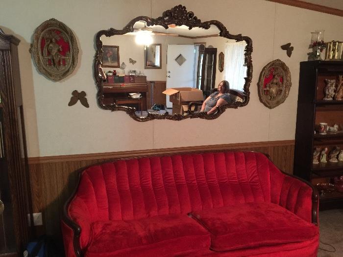 antique red sofa, antique mirror, victorian wall art