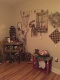 rustic cabinet, window, garden trellis, wood crates, birdhouses, red table with mosaic top, misc