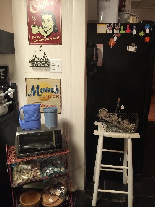 metal table, toaster Westinghouse pitcher, wicker stool, cast iron garden tool hanger, signs,bag corks, bag bottle caps