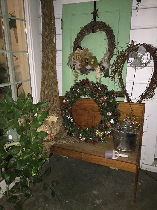 bench/pew, ivy and plant stand, wreaths, tin bucket, burlap open weave fabric