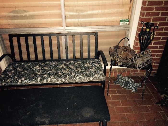 metal bench with arms and cushion, bench, no arms, small metal table, with decor