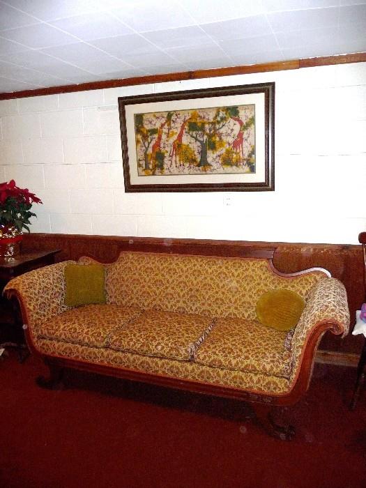 ornate sofa / several unusual art works