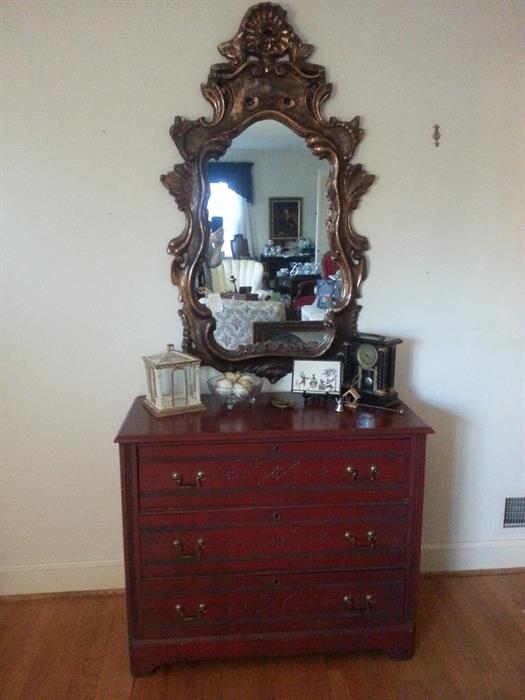 Antiqued red vintage 4 drawer chest with goldleaf and red mirror