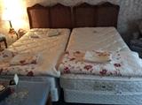 Twin Sleep Number beds with caned headboards