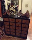 Drawers on top, doors on bottom ... and terrrrrific selection of men's and women's shoes!  And by the way, the "S" stands for Super Sale :)