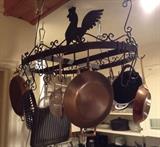 Quality pots and pans and a darling rooster pot rack