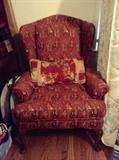 one of two matching wing back chairs