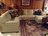 neutral sectional and fantastic hand woven rug
