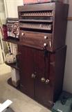 old sewing cabinet on top of a cool old cabinet'