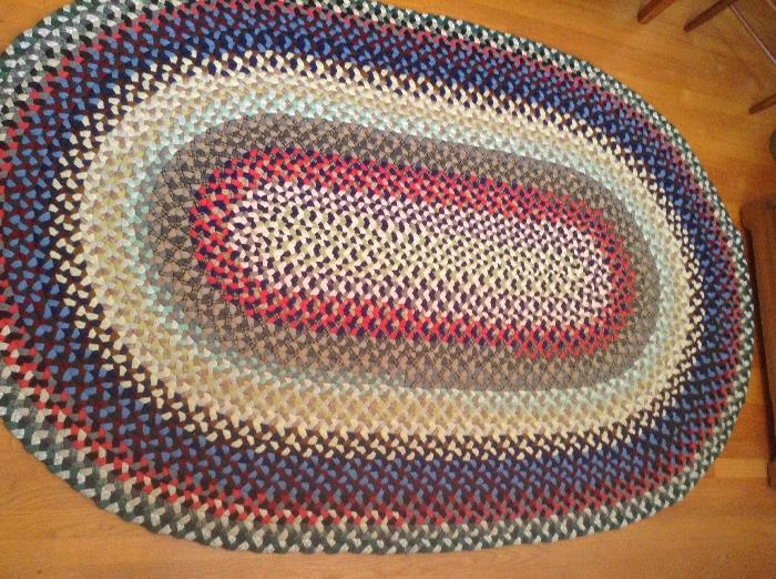 Vintage hand woven braided rug. All braided rugs hand made by the late home owner.