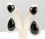 Black and White diamond earrings set in 18K white gold, 4 black diamonds with a total weight of 93.11cts, 306 round diamonds 9.22cts. CALL WILL MUNYON TO DISCUSS THESE EARRINGS -- PHONE: 800-289-2850 SALE PRICE UPON REQUEST. FINE JEWELRY RETAIL VALUE: $80,000.00 --- viewing in the Los Angeles area by appointment only. Call 800-289-2850 and speak with Will to make an appointment.