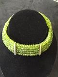 5MM PERIDOT BEAD CHOKER IN 18K Y/G WITH 1.65 CARATS OF DIAMONDS. ORIGINAL COST WAS $15,000. SALE PRICE UPON REQUEST. CALL WILL @ 800-289-2850 FOR SALE PRICE.