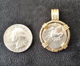 14K GOLD PENDANT WITH PEGASUS COIN & .4 CARATS OF DIAMONDS