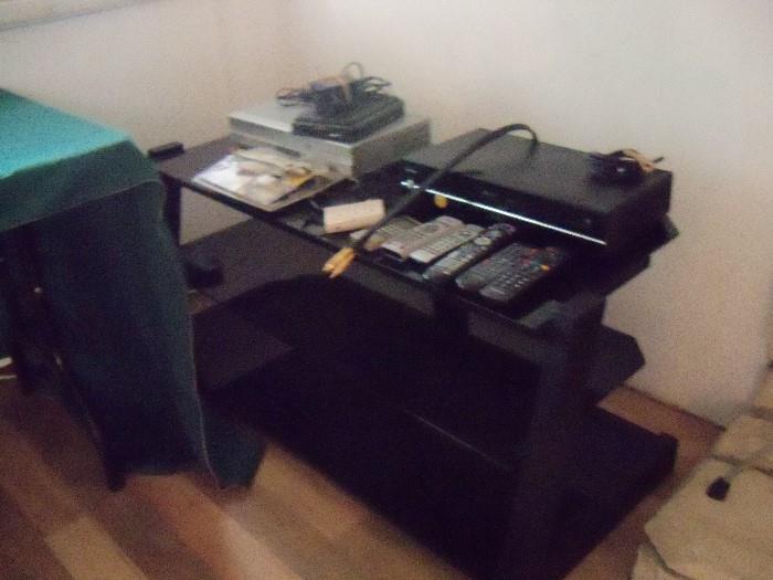 BLACK GLASS TV STAND, REMOTES, VCR