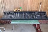 vintage Triumph neon lighted sign