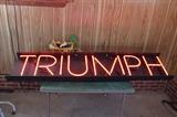 vintage Triumph neon lighted sign