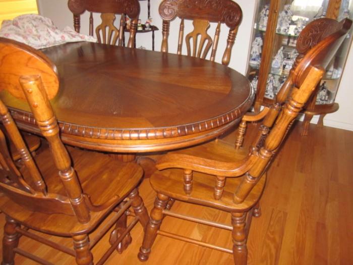 Dining room set...table with fold out leaf and 8 chairs