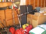 Gas powered weed wackers, gas cans, shutters