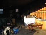 Many items in large outdoor garage