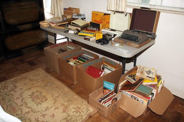 Cameras, one of the typewriters, books, records and more.