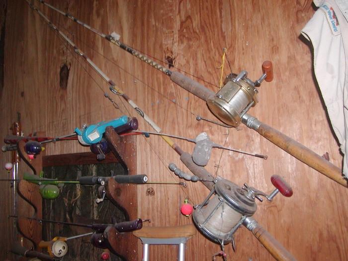 vintage deep sea rods and reels,  penn reels -- on is a penn international 60 I think and the other is a penn senator.  there is also a third deep sea rod and reel not shown