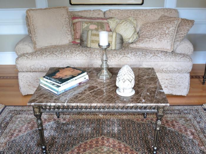 Damask sofa and marble top coffee table