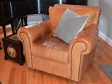 Leather arm chair with nailhead trim