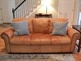 Leather sofa with nailhead trim