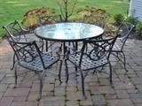 Metal and glass patio set with table and 6 chairs