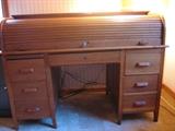 Antique oak roll top desk.