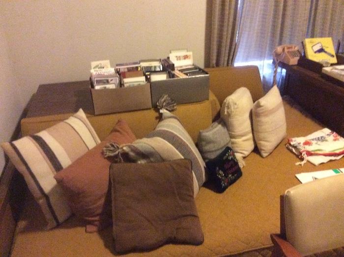 L shaped daybed, pillows, cards