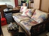 Rattan sofa and small items.